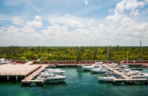 Playa Mujeres Apartment | Ph en resort de lujo con acceso a la playa y todas las amenidades