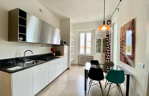 Acquabella Apartment | Piazzale Susa Bright Flat with Veranda
