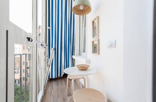 Acquabella Apartment | Piazzale Susa Bright Flat with Veranda