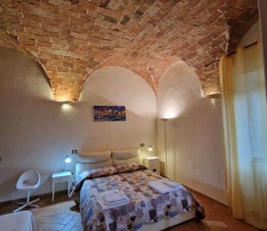 Chianni House | Piccola casa toscana con giardino con vista mozzafiato