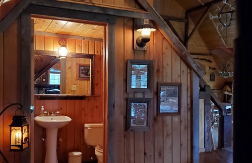 Menominee Cabin | Pinewoods Springs Lodge with Tower, 240 forested acres & 1 acre Pond