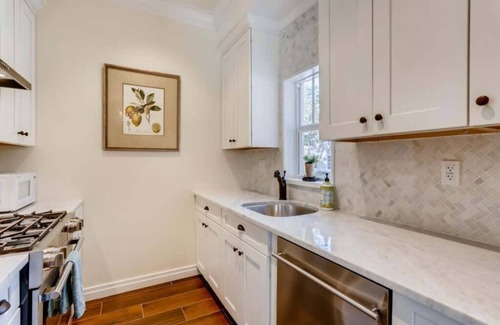 Grandview Heights House | Pink House - Bask in Style Steps from the Convention Center