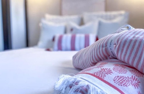 Singer Island Apartment | Pink Paradise at Seascape. Getaway by the beach!