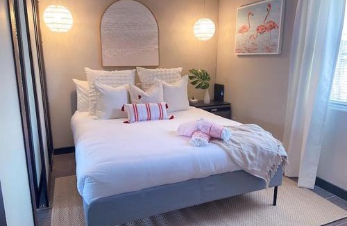 Singer Island Apartment | Pink Paradise at Seascape. Getaway by the beach!