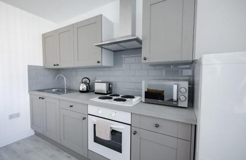 Hull Apartment | Platform Stadium apartment with parking
