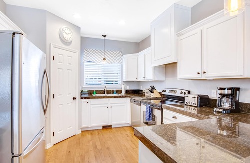 Donnelly House | Pleasant home with mountain views & fireplace - dog, family & fisherman friendly