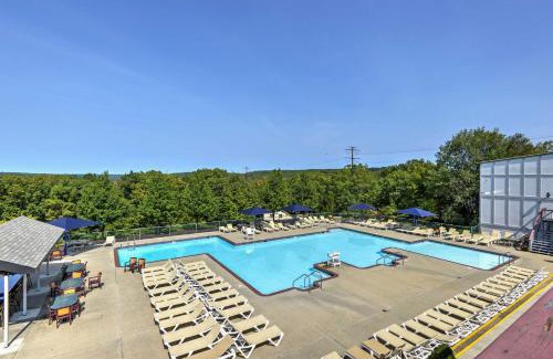 Bushkill House | Poconos Vacation Rental with Pool Access and Hot Tub!