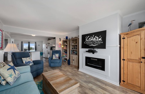 Nags Head Condo | Pooh's Corner: Oceanfront condo & Patio, steps to the beach, dog friendly!