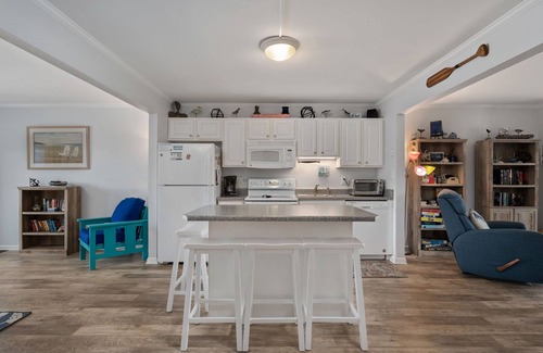 Nags Head Condo | Pooh's Corner: Oceanfront condo & Patio, steps to the beach, dog friendly!