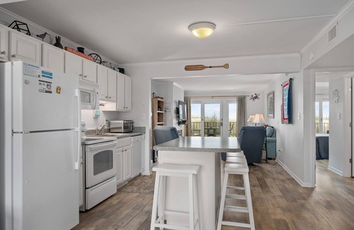 Nags Head Condo | Pooh's Corner: Oceanfront condo & Patio, steps to the beach, dog friendly!