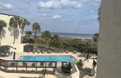 Butler Beach Condo | Pool and Ocean Views. Steps from the beach