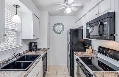 Rockport Condo | Pool, Boat dock, Pier, Boat Launch, and BBQ area all at an affordable price!