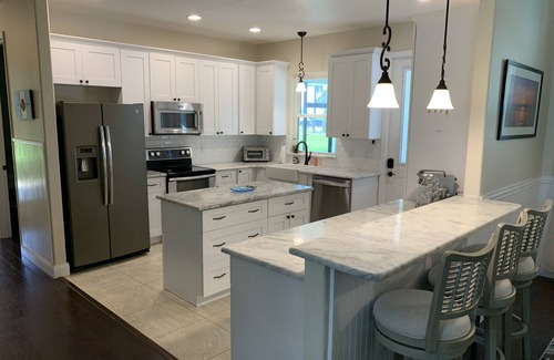 Edgewater House | Pool home overlooking River with NEW private pickle ball court!