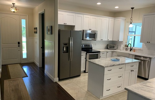 Edgewater House | Pool home overlooking River with NEW private pickle ball court!