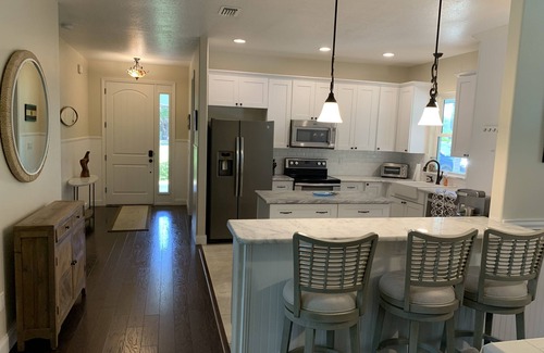 Edgewater House | Pool home overlooking River with NEW private pickle ball court!
