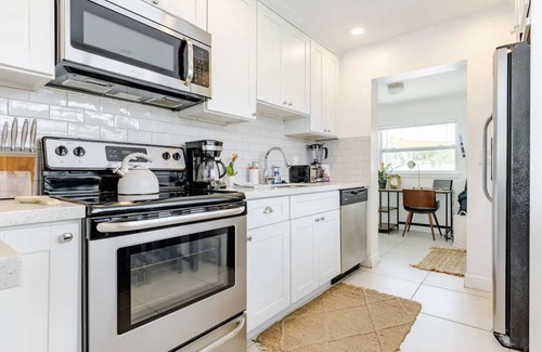 Lake Worth Cottage | Pool, Hot tub, 5 min to beach! The Monkey Cottage!