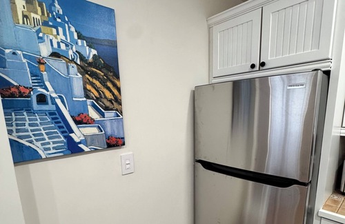 Harbor Village Condo | Poolside 2BR Retreat Canal Dock 6 minutes Walk to the Beach