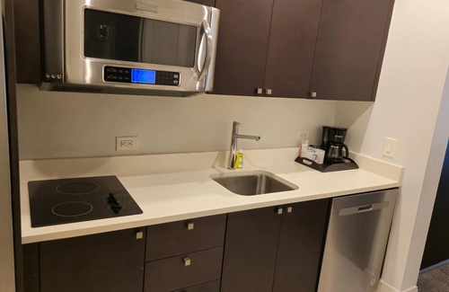 Doral Condo | Poolside Massages, kick back, relax, & reconnect