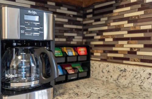South Side Condo | Poolside this Summer at Cozy Gardens Retreat