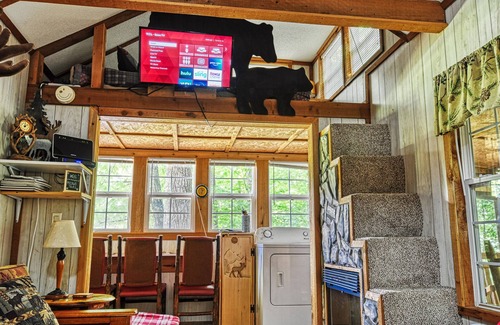 Cosby Cabin | “Porch and Pine” not-so-tiny Tiny Log Cabin