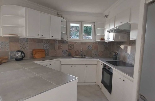 Grosseto-Prugna Apartment | Porticcio garden level. 70 m2. Private garden and parking. Quiet location. Sleeps 2 to 5,
