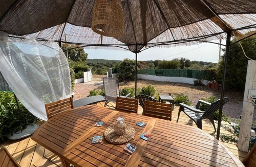 Grosseto-Prugna Apartment | Porticcio garden level. 70 m2. Private garden and parking. Quiet location. Sleeps 2 to 5,