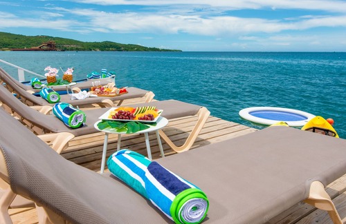 Discovery Bay House | Portside Villa: Private deck and beach access, with amazing views of the ocean