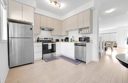Burlington House | Posh 4 Bed Home with Backyard in Great Location