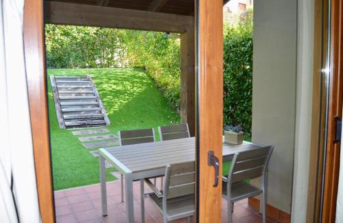Mino House | Precioso adosado en Urbanización con campo de golf