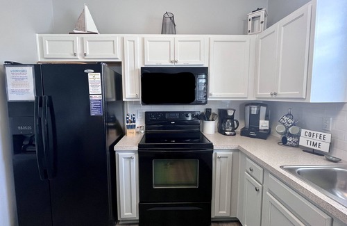 North Myrtle Beach Condo | Premier Golf Location - Barefoot Resort! Family/dog friendly - 2 pools/beach!