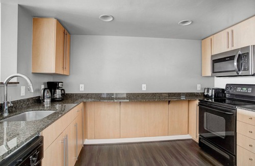 Woodmont Triangle Apartment | Premium Bethesda 1BR w/Concierge, Gym, W/D, walk to Metro, by Blueground