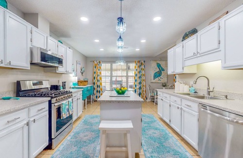 Ono Island House | Pretty in Perdido Key - Home with kitchen, patio, playground, central AC, & W/D