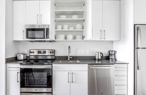 St. Elizabeth's Apartment | Prime Brighton 1BR w/W/D, Gym, near T, Shops + Dining, by Blueground