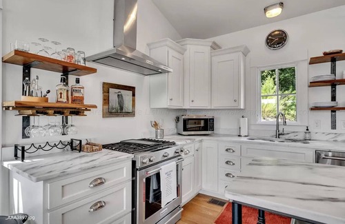 Crane Hill House | Prime location on Lewis Smith Lake. Clean, modern cottage vibes, but sleeps 9!