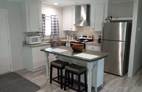 Crystal River House | PRISTINE AIR 2 ACRES CLEANSED DAILY BY HUGE OAKS, PALMS AND GULF BREEZES