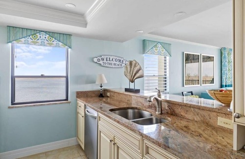 Punta Rassa Condo | Pristine Waterfront Residence with Panoramic Water Views - Pool Open!