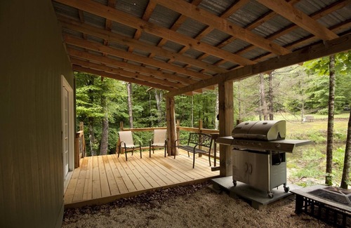 Sequatchie House | Private 50 ft waterfall. Eco-friendly, cozy shipping container cabin