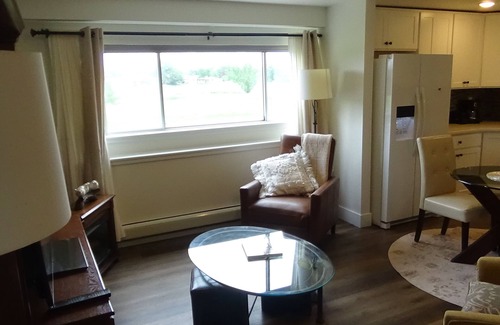 Loveland House | Private, beautiful one-bedroom basement apartment, with walkout and amenities!