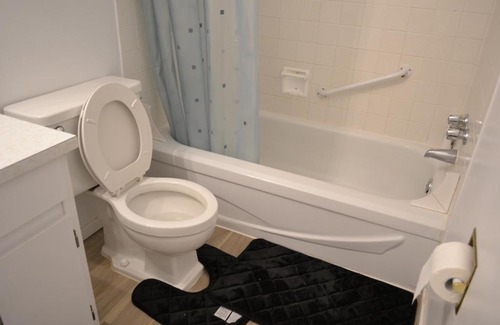 Southeast Calgary House | Private bedroom on renovated duplex main floor - Dover