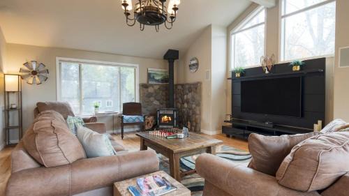 Three Rivers House | Private Boat Ramp Access Hot Tub Fire Pit Deck River Meadows by AvantStay