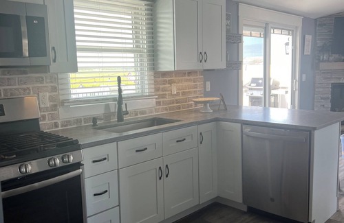 Tuckerton Beach House | “Private Dock, Lagoon Front, Beautiful Meadow View at the Fisher Cottage”