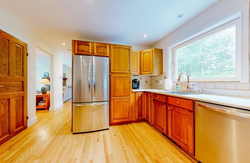 Manchester House | Private home with fireplace, grill, games, AC & great Manchester location