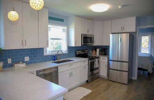 Galveston House | Private Hot Tub with outdoor shower and tiki area to relax and Enjoy!