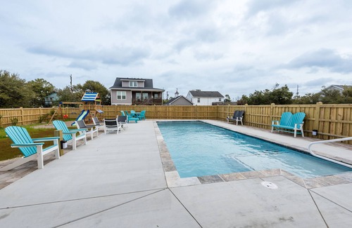 Kill Devil Hills Apartment | PRIVATE King Suite, POOL, GRILL,outdoor shower,coffee bar,mini fridge,microwave