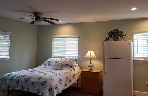 Fern Acres Apartment | Private large studio with wrap around lanai, new and clean.