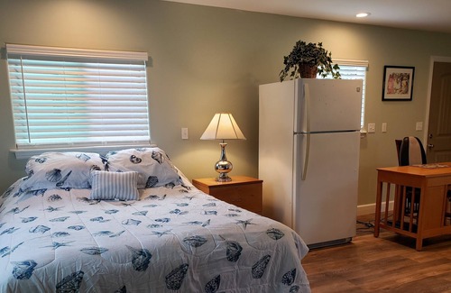 Fern Acres Apartment | Private large studio with wrap around lanai, new and clean.