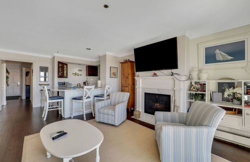 Boyne City Condo | Private Patio on Lake Charlevoix | Ground Floor Getaway with sunset views |
