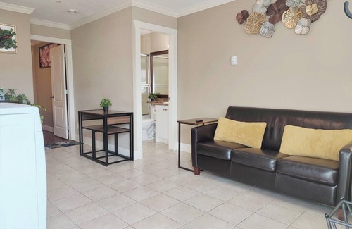 Metrotown Apartment | Private Suite with King Bed. Ground Level