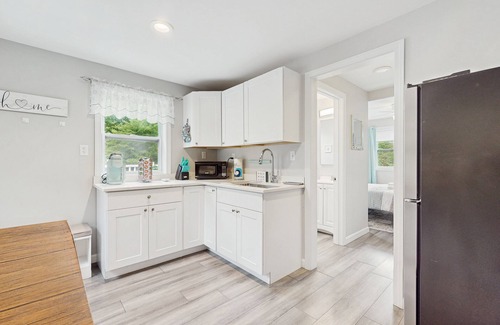 Oak Bluffs Apartment | Private suite with roof deck, near golf, bus stop, shops, and trails