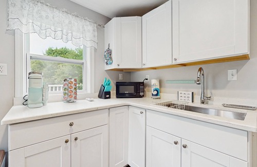 Oak Bluffs Apartment | Private suite with roof deck, near golf, bus stop, shops, and trails